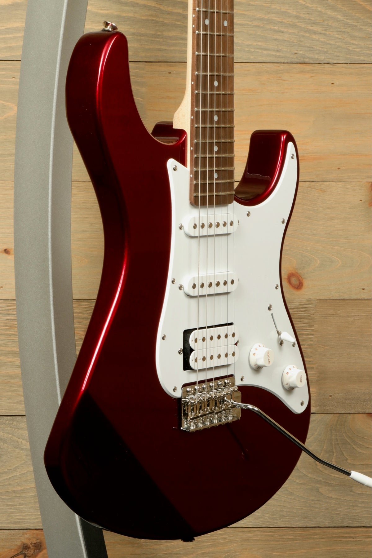 Yamaha PAC012 Pacifica Electric Guitar in red finish, side view showcasing design and features