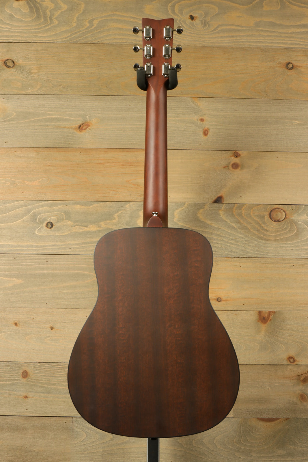 Yamaha acoustic guitar acoustic guitar, mahogany body, rear view showcasing smooth finish