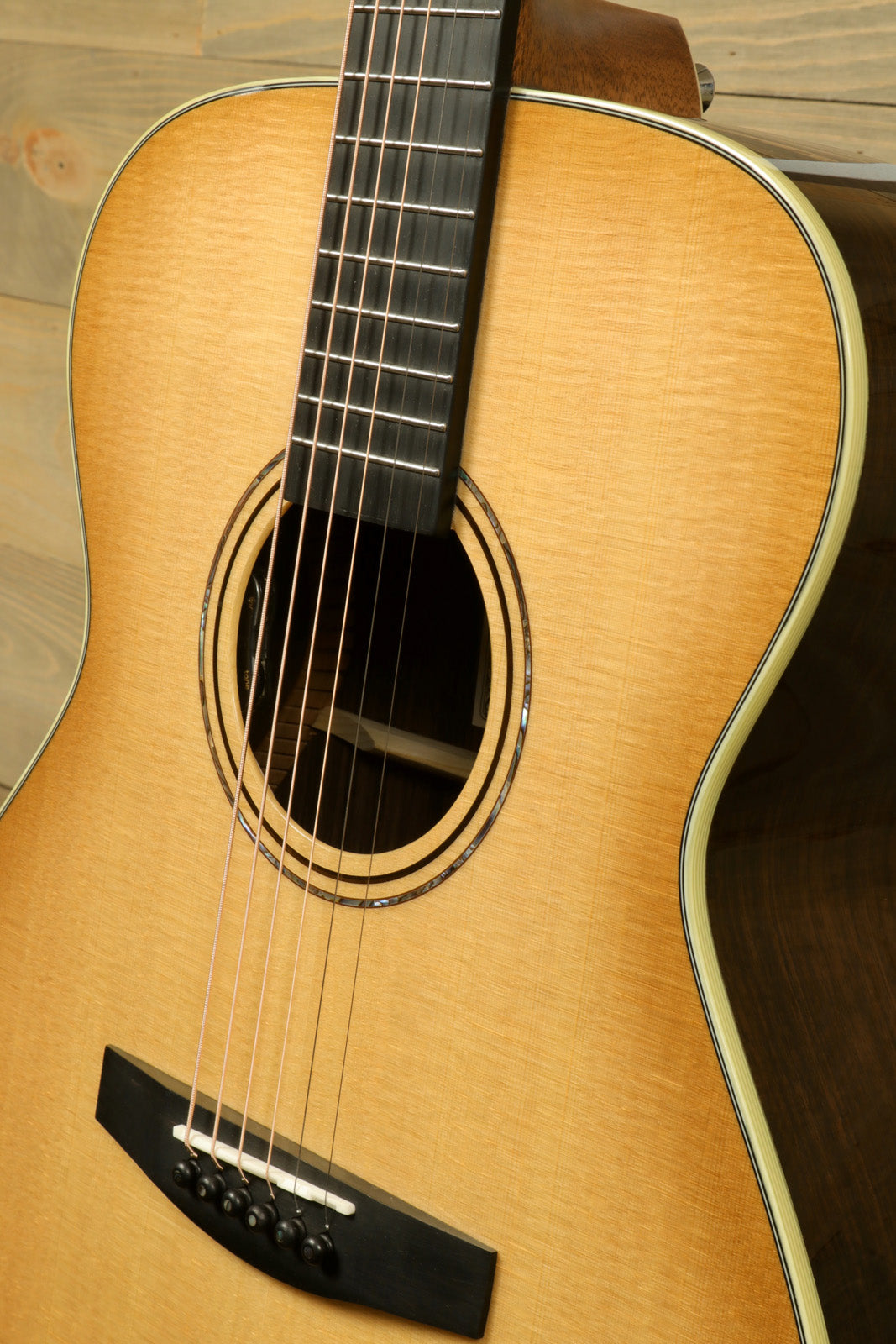 Alvarez LF70e Daybreak acoustic electric guitar with natural finish, front view showcasing the body and strings
