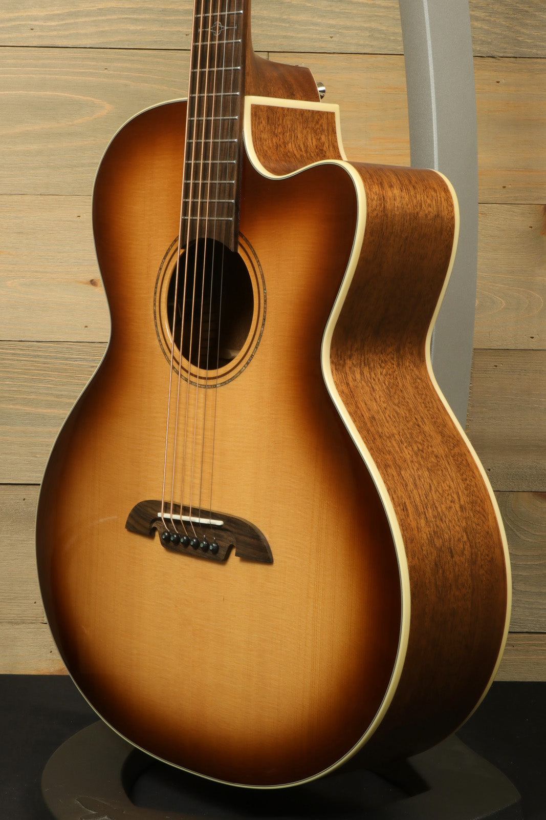 Alvarez Baritone Acoustic Electric Guitar in sunburst finish, side view showcasing its elegant curves
