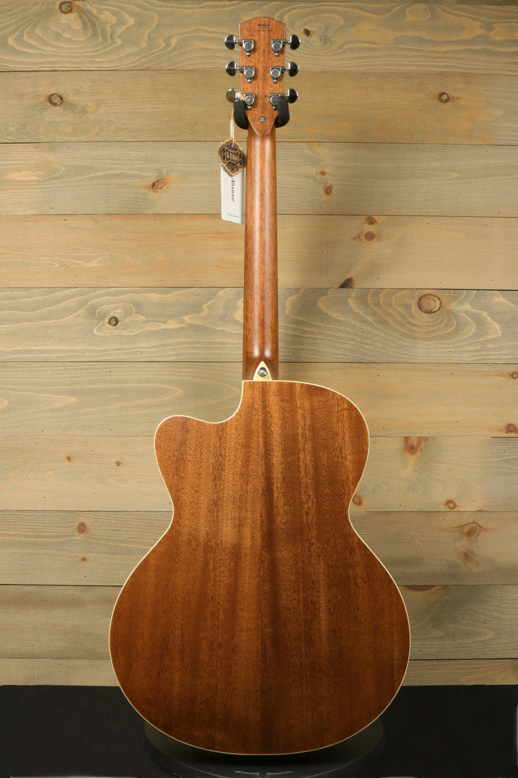 Alvarez Baritone Acoustic Electric Guitar with a natural wood finish, back view featuring curved design