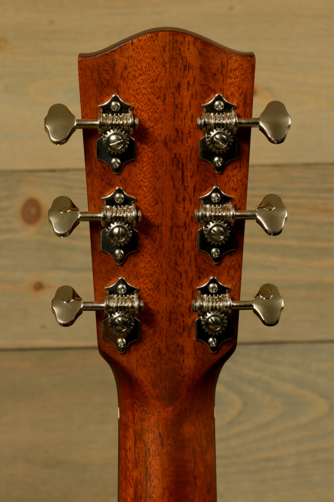 Eastman E1OOSS-DLX-SB acoustic guitar headstock with six tuning pegs, back view