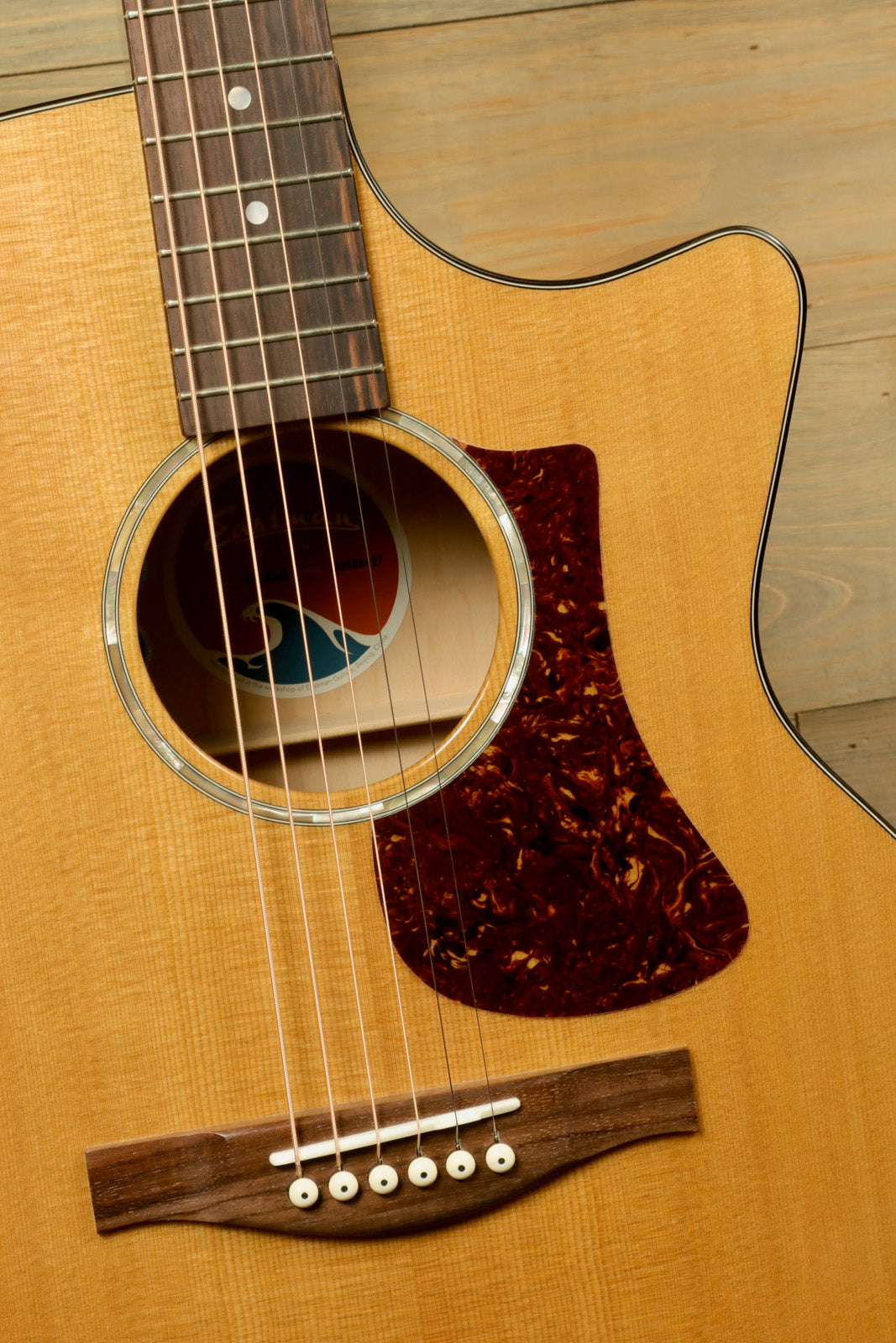 Eastman PCH3-GACE Amberburst Acoustic Guitar with brown pickguard and detailed soundhole, front view