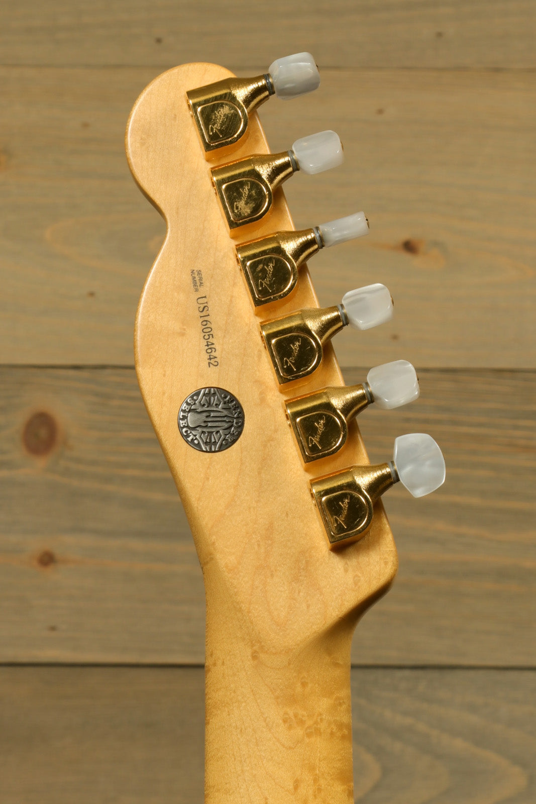 Fender Limited Edition Select Light Ash Telecaster, natural wood finish, headstock view with tuning pegs