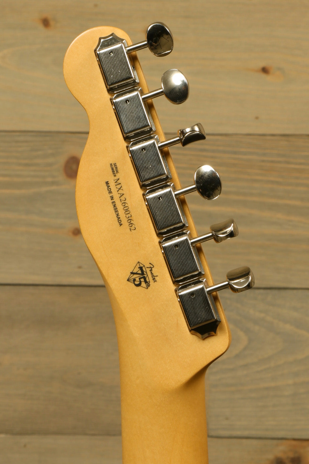 Fender Player II Telecaster headstock with tuning pegs, natural wood finish, back view