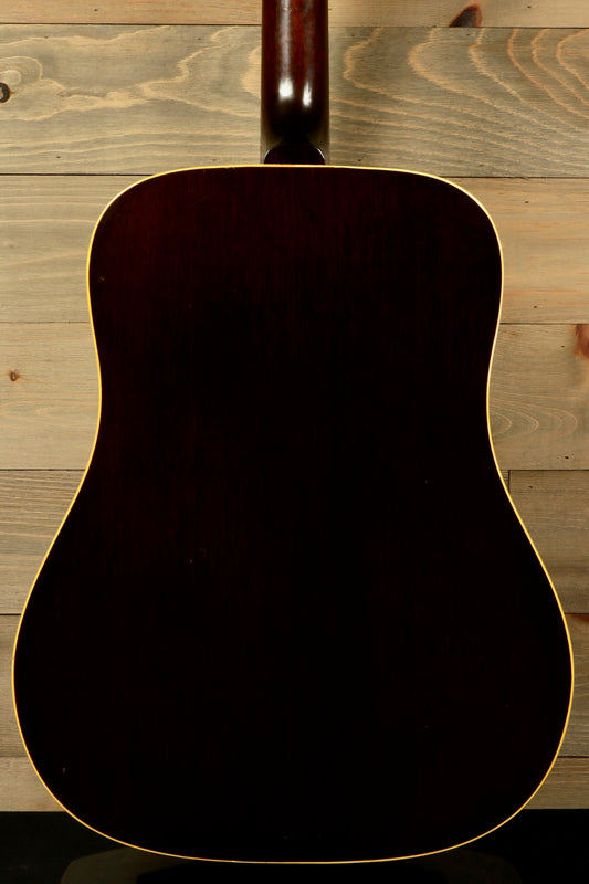 Back view of the 1968 Gibson J-50 Deluxe for sale showcasing its elegant design and rich wood finish