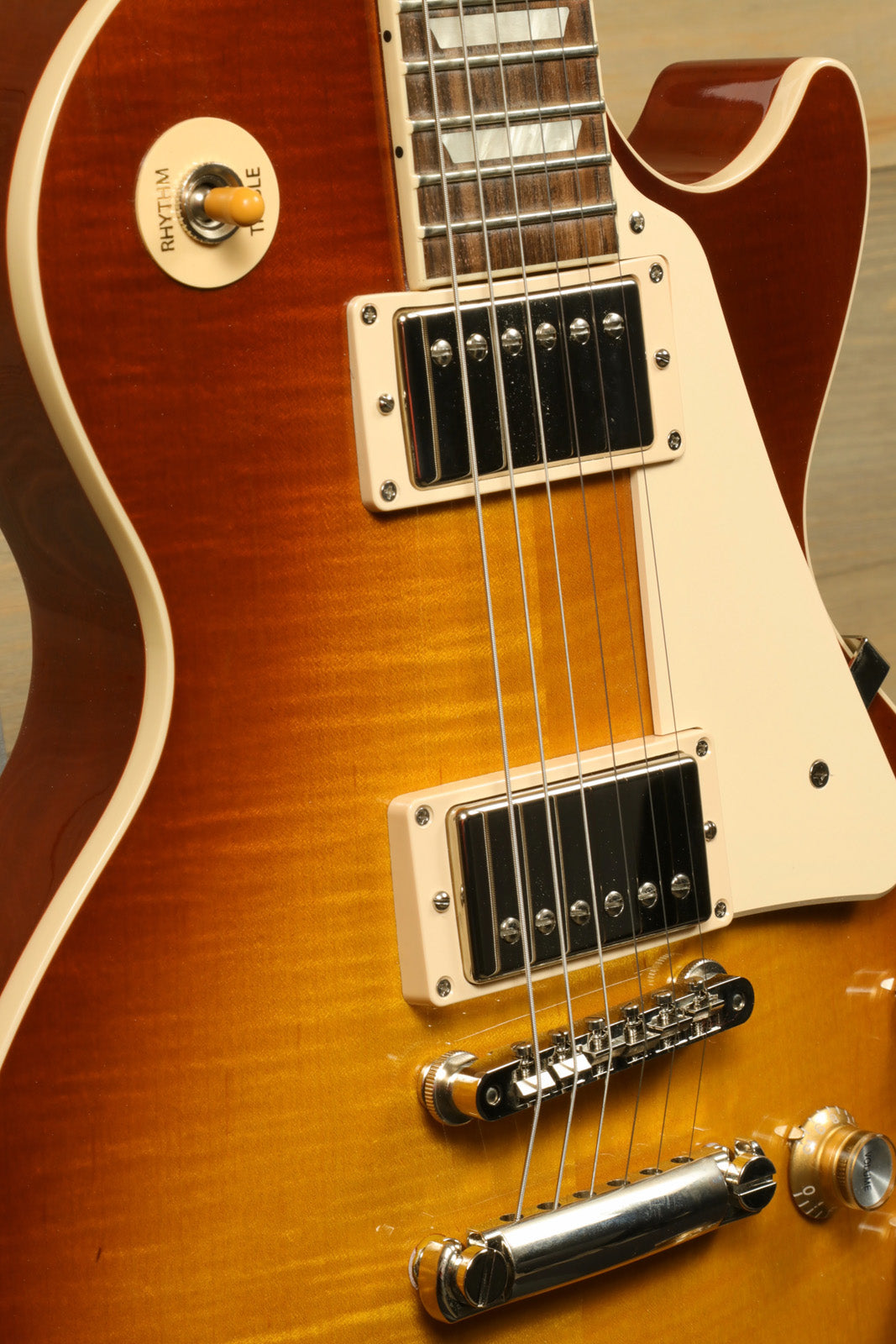 Gibson 2019 Les Paul Standard '60s Iced Tea, side view with sunburst finish and chrome hardware