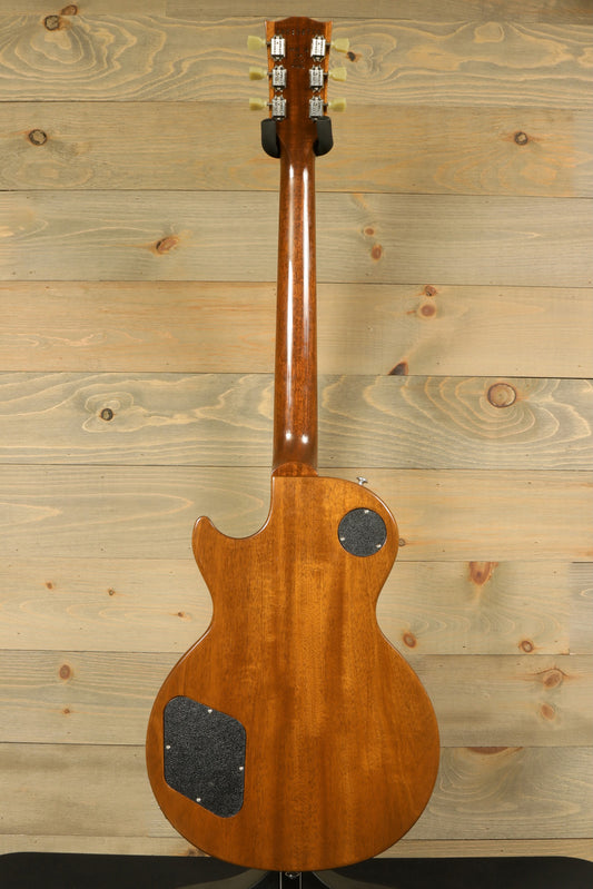 Back view of a used 2016 Gibson Les Paul Traditional Plus showcasing its smooth wood finish