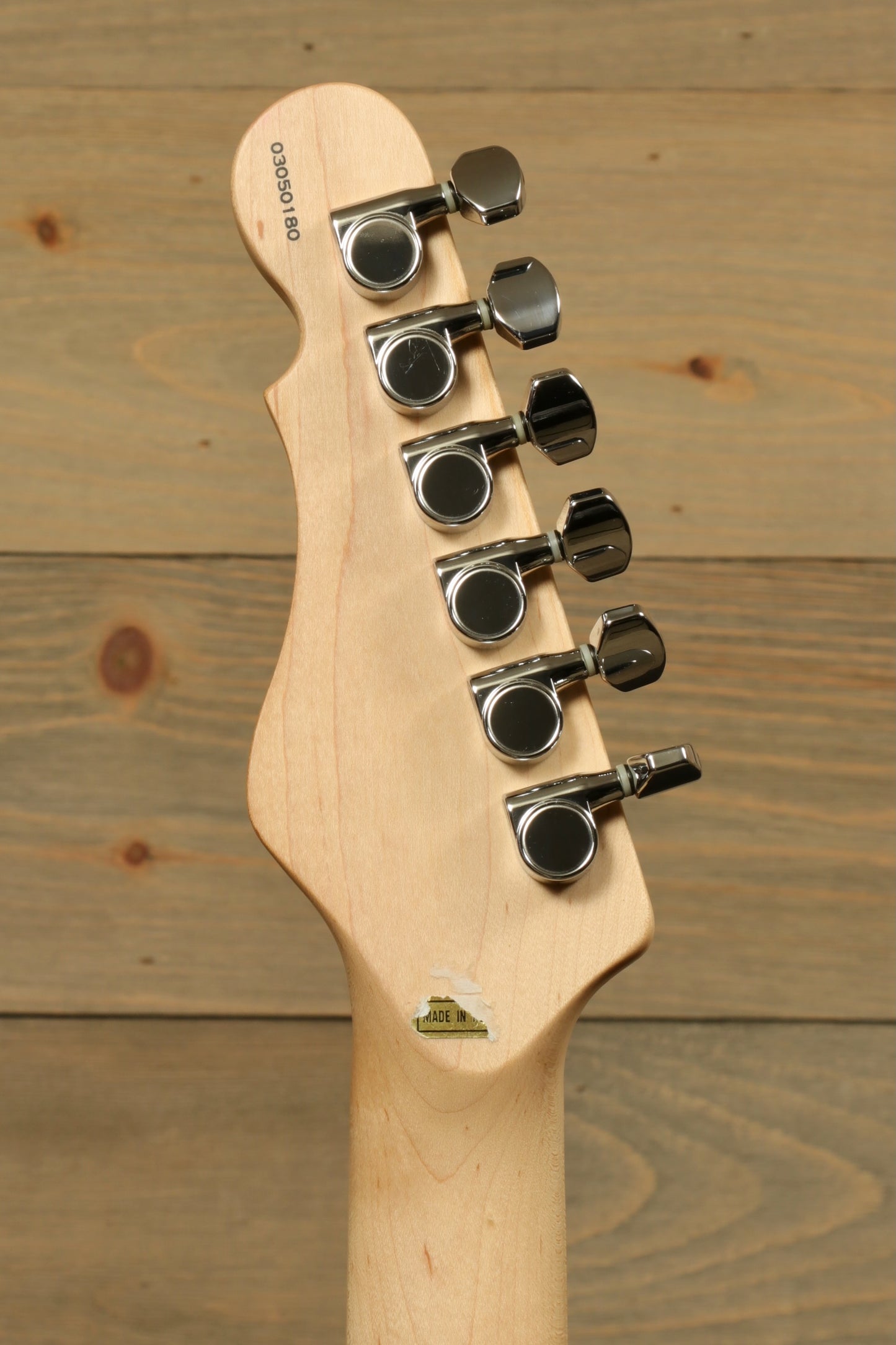 G&L Tribute ASAT Classic with G&L Gig Bag showcasing the guitar's headstock and tuning pegs