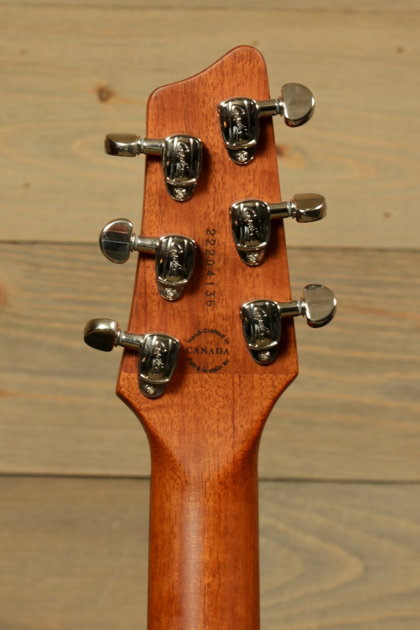 Back of Godin A6 Ultra Denim Blue Flame Acoustic Electric Guitar showcasing tuning pegs and wood finish