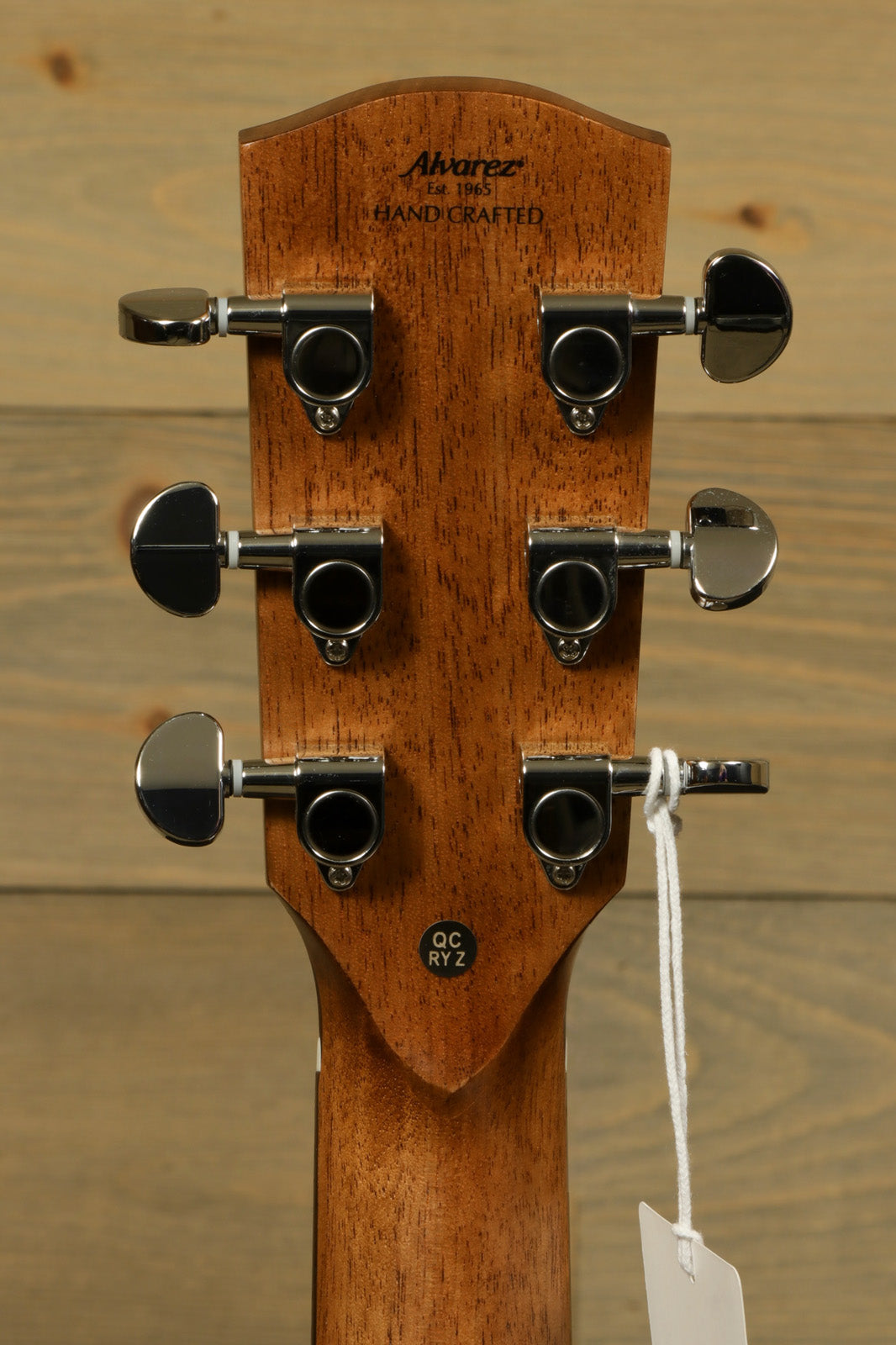Alvarez AF30CE Artist Series Acoustic-Electric Guitar, natural finish, headstock view showing tuning pegs