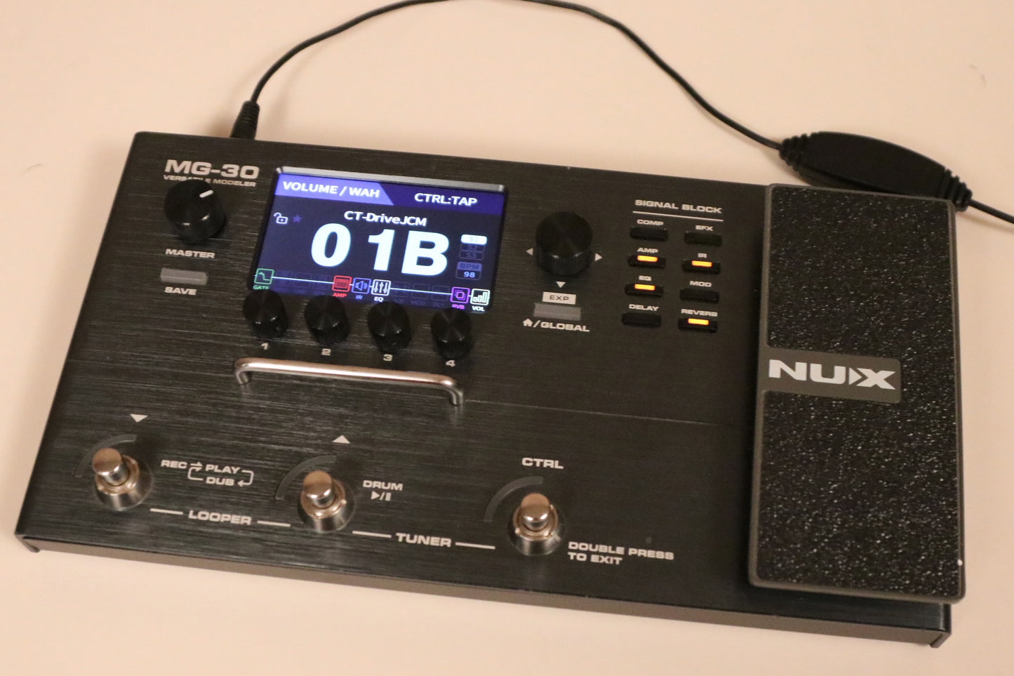 NU-X MG-30 versatile modeling guitar processor in black with color display, top view