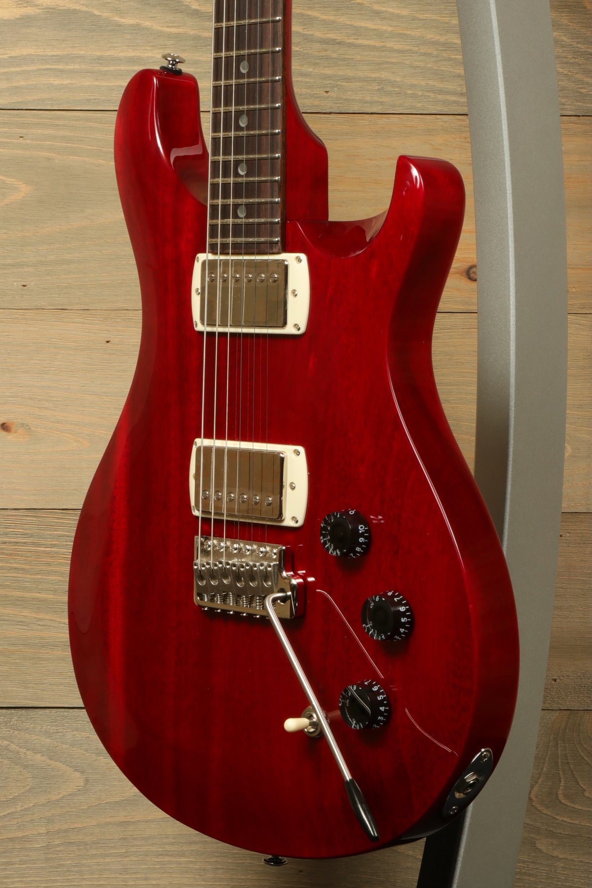 PRS SE DGT Standard guitar in stunning red finish with gold hardware and sleek design