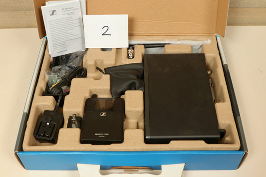 Sennheiser Wireless In Ear Monitors black box set with accessories, front view in original packaging
