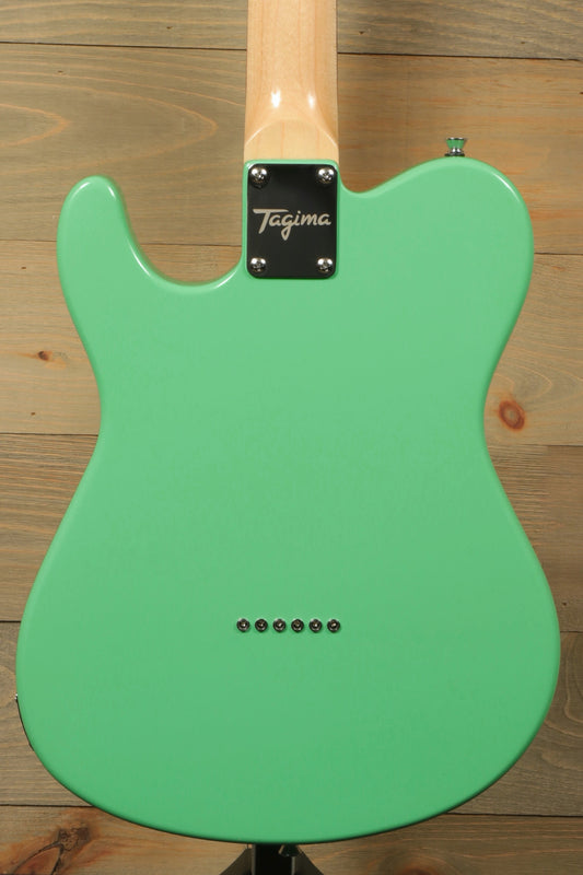Tagima electric guitar guitars in mint green, back view showcasing sleek finish and hardware