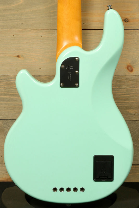 Back view of used Sire Marcus Miller Z7 5 string bass guitar in mint green with a sleek finish