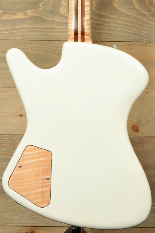 Back view of Weller ElDorado electric guitar in white with natural wood accents on a wooden background