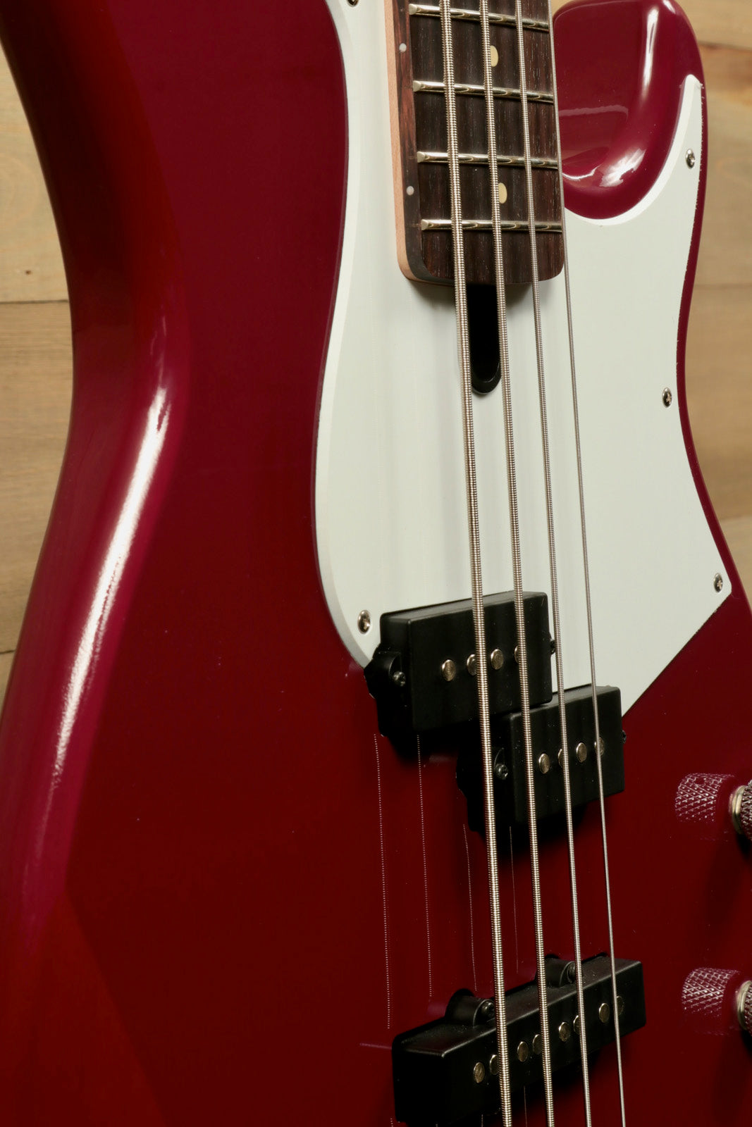 Yamaha BB234 4-String Electric Bass Guitar Raspberry Red, close-up view showing body finish and pickups