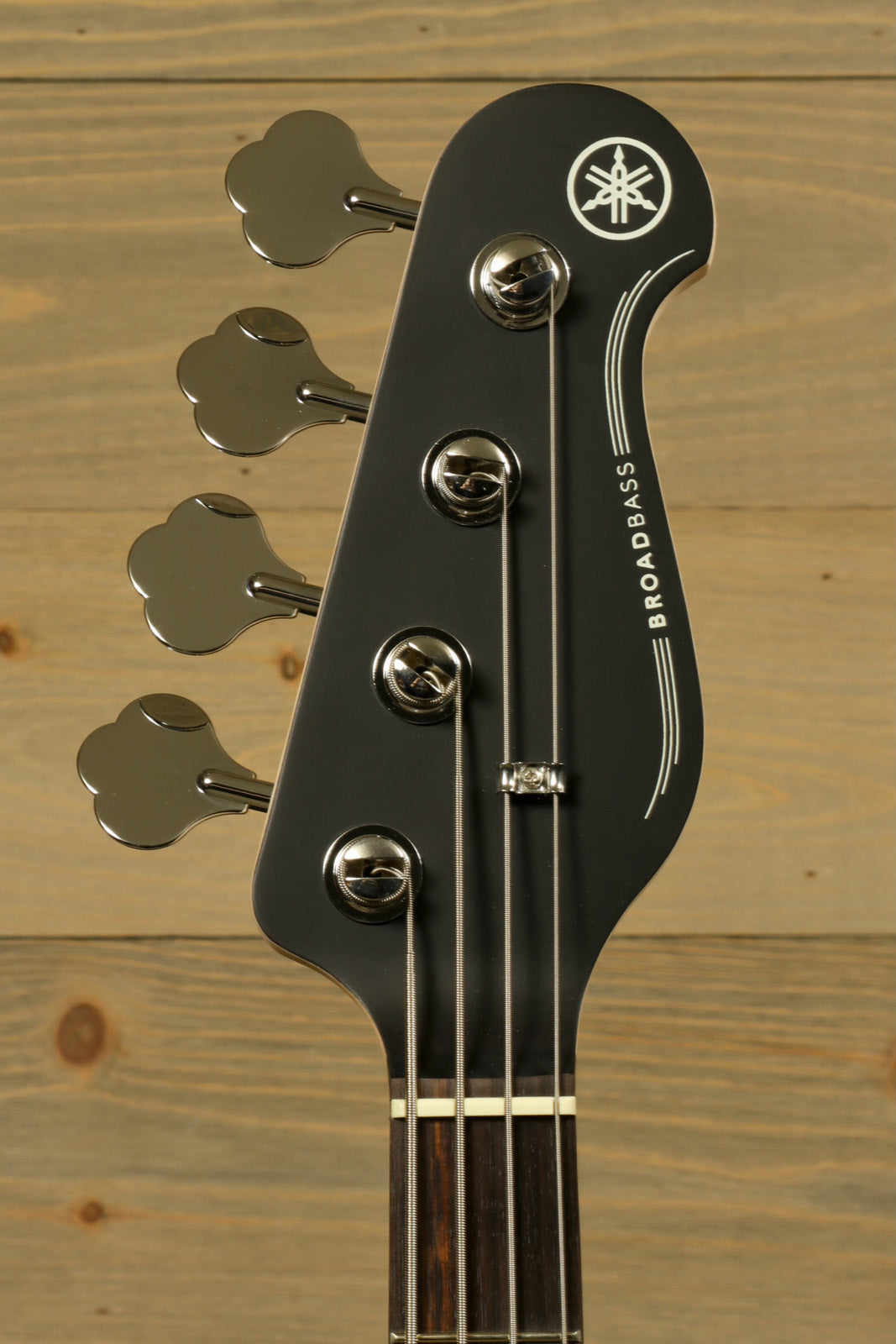 Yamaha BB234 4-String Electric Bass Guitar Raspberry Red, headstock view with tuning pegs
