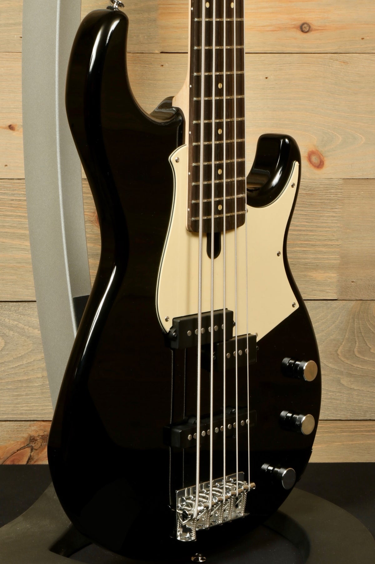 Yamaha BB435 5-String Electric Bass Guitar in black, side view showcasing its sleek design and hardware