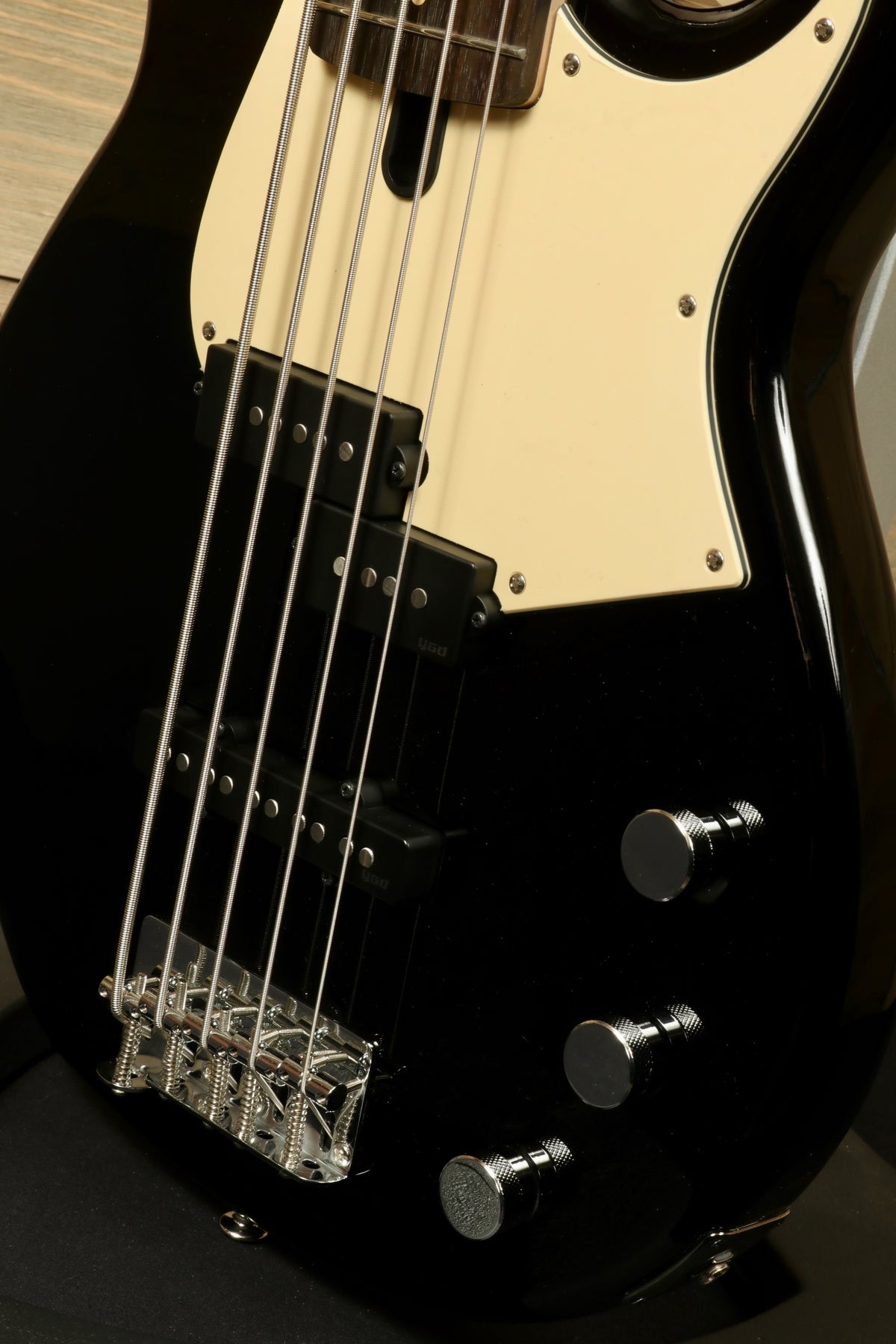 Yamaha BB435 5-String Electric Bass Guitar in black, close-up view of strings and controls