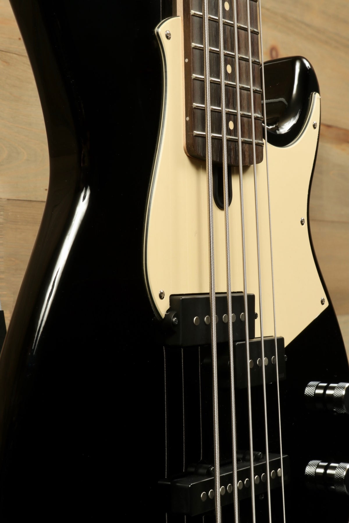 Yamaha BB435 5-String Electric Bass Guitar in black, side view showcasing the body and pickups