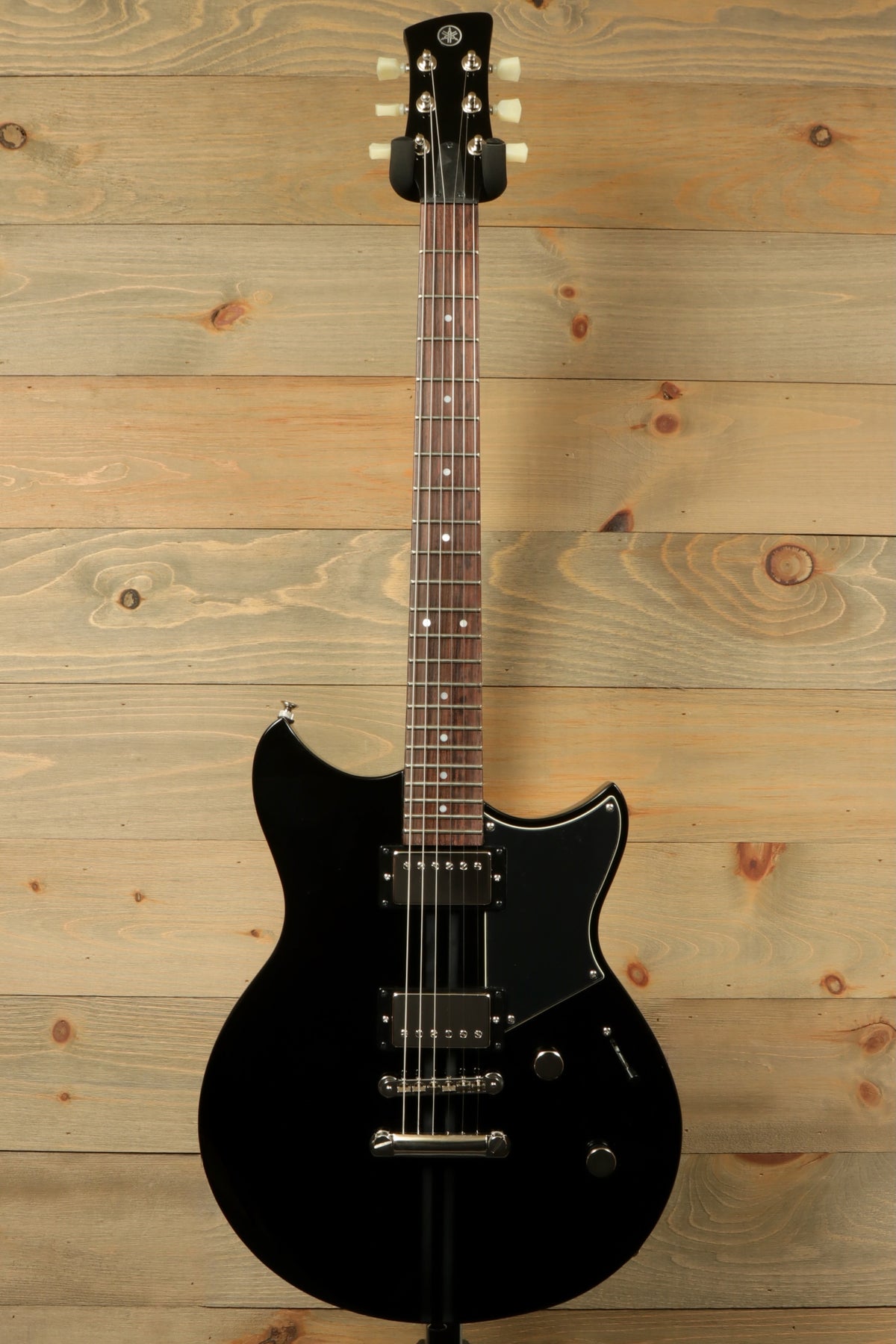 Yamaha Revstar Element RSE20 Electric Guitar in Black, front view with dual pickups and sleek design