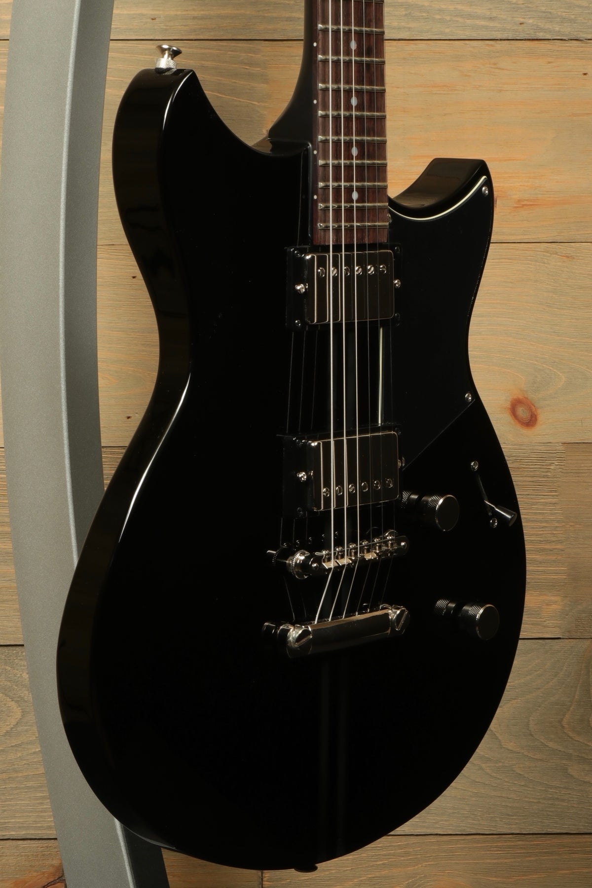 Yamaha Revstar Element RSE20 Electric Guitar Black, side view showcasing sleek design