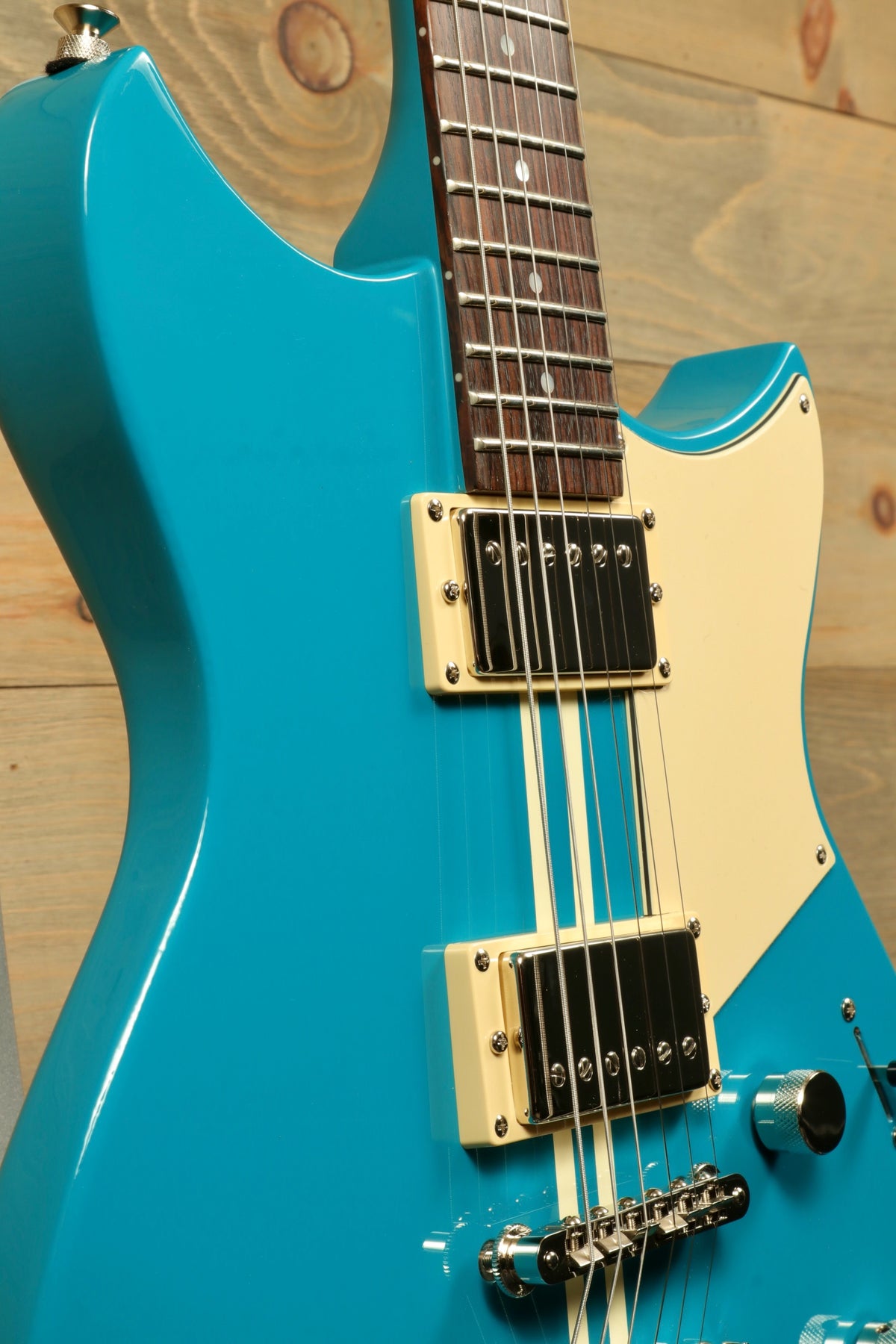 Yamaha Revstar Standard RSS20 Electric Guitar Swift Blue, angled view showcasing body and pickups