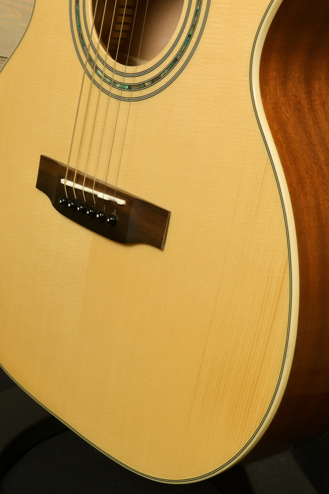 Close-up of Zager ZAD-50 OM/N Acoustic Electric Guitar with Hardshell Case showcasing fine craftsmanship