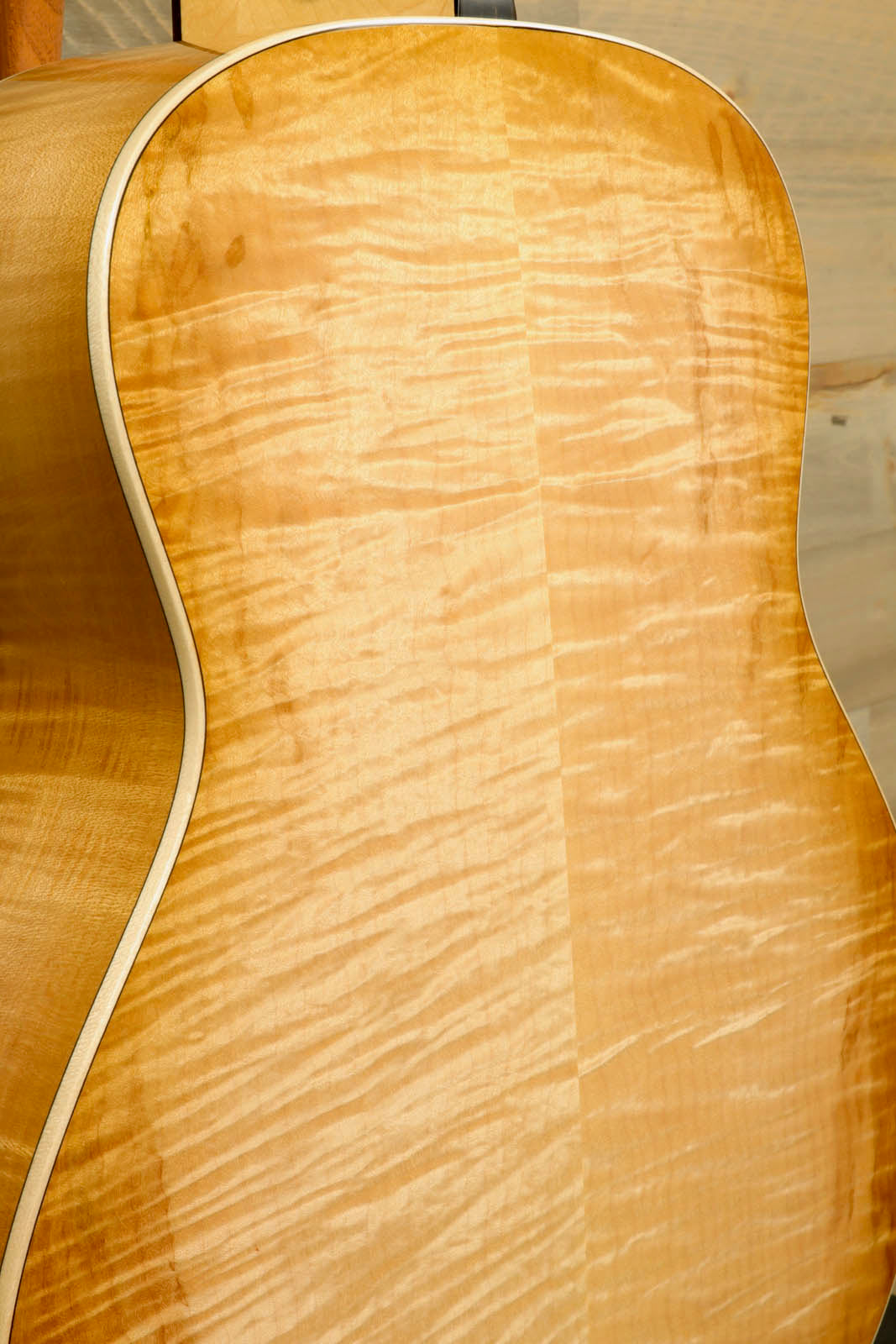 a close up of a wooden guitar neck