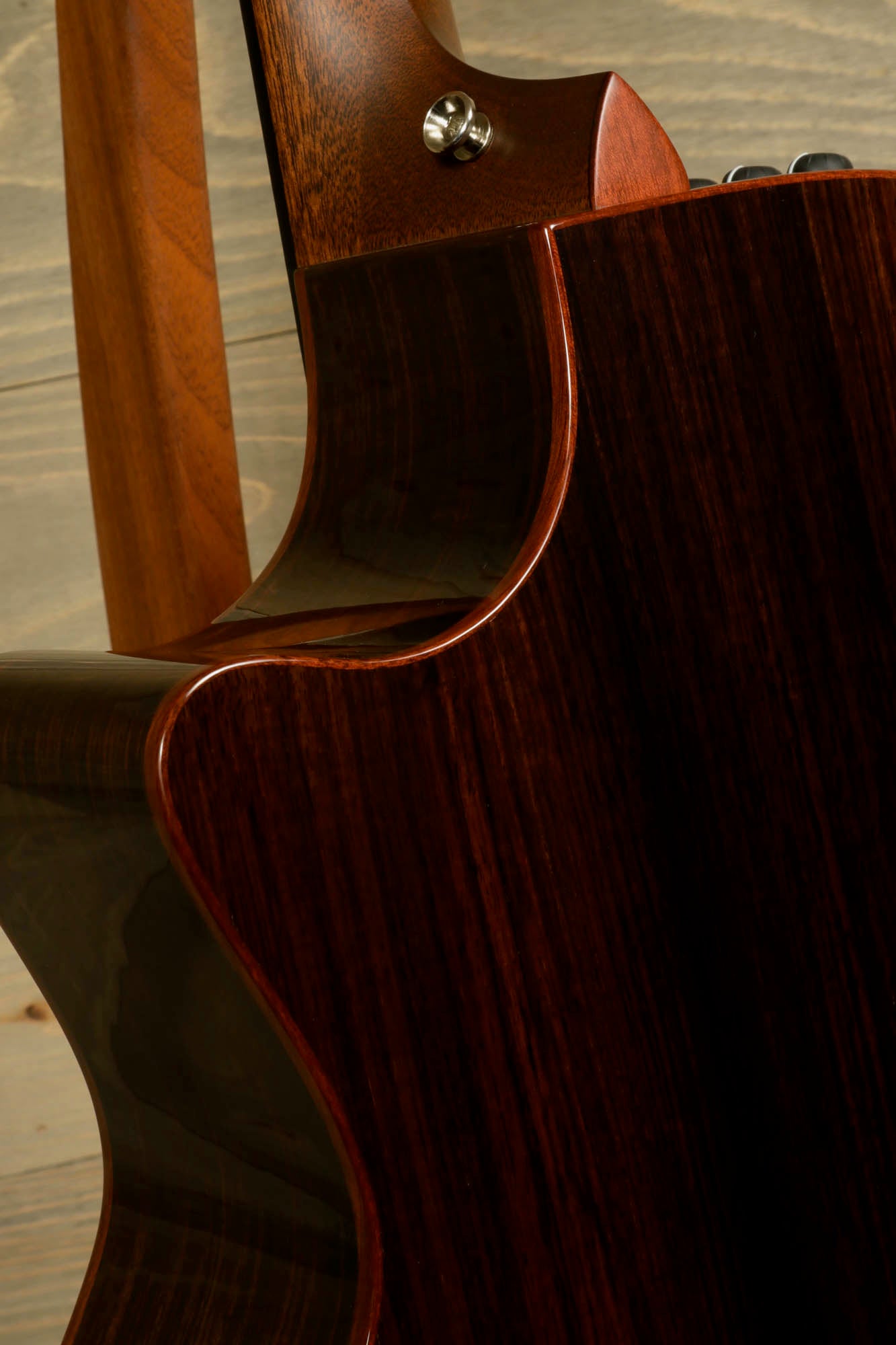 a close up of a wooden guitar case