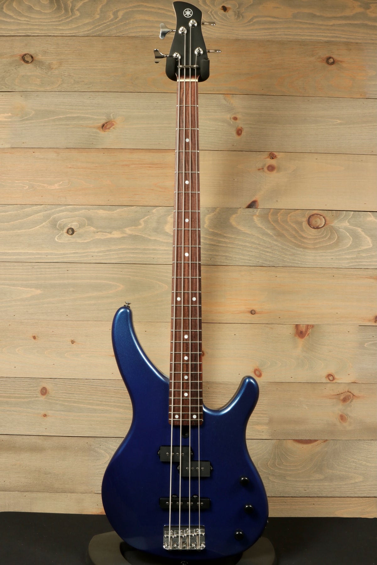 Yamaha TRBX174 electric bass guitar in blue with a sleek finish, front view