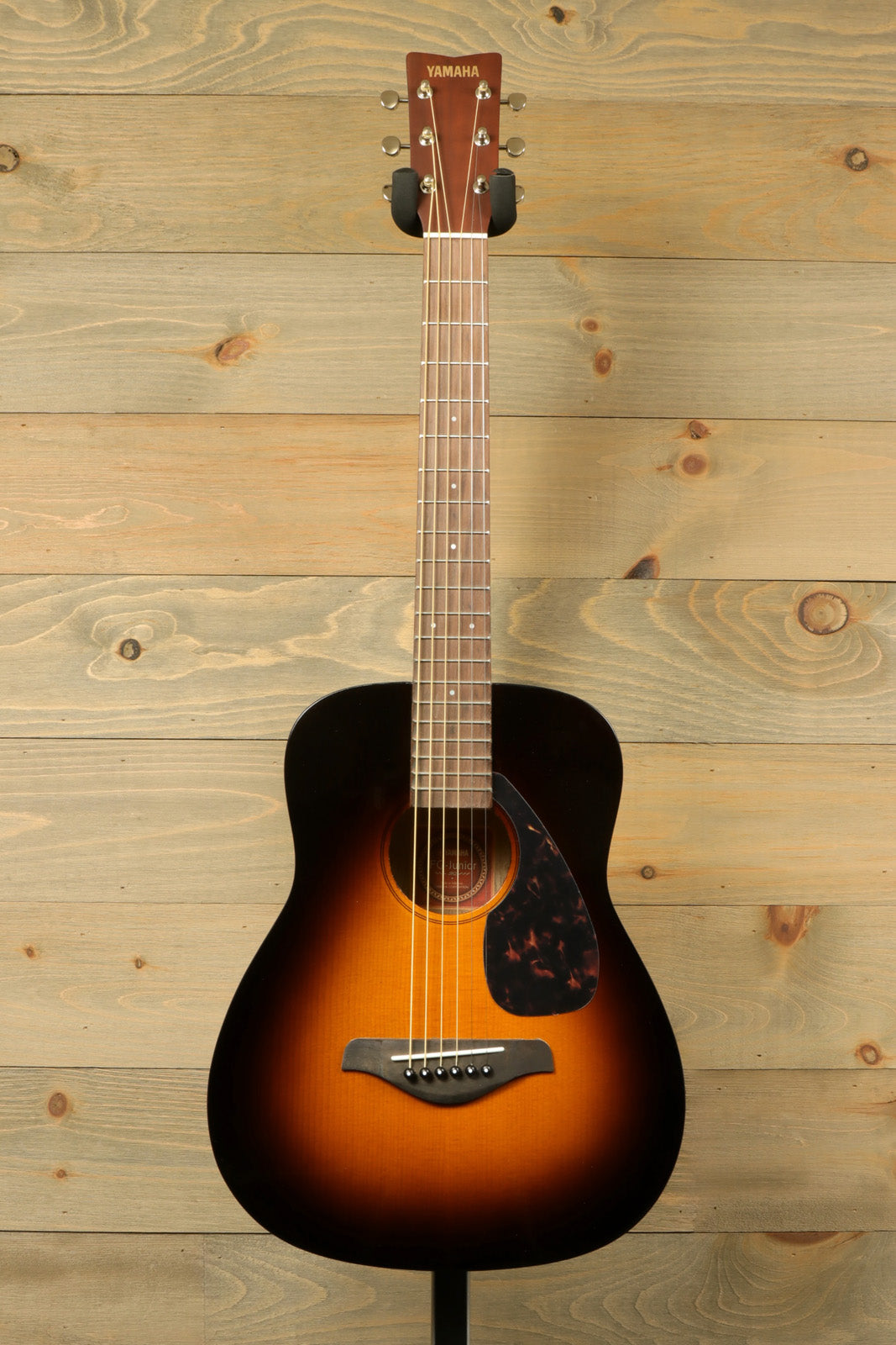 Yamaha acoustic guitar sunburst finish, front view with classic shape and detailed fretboard