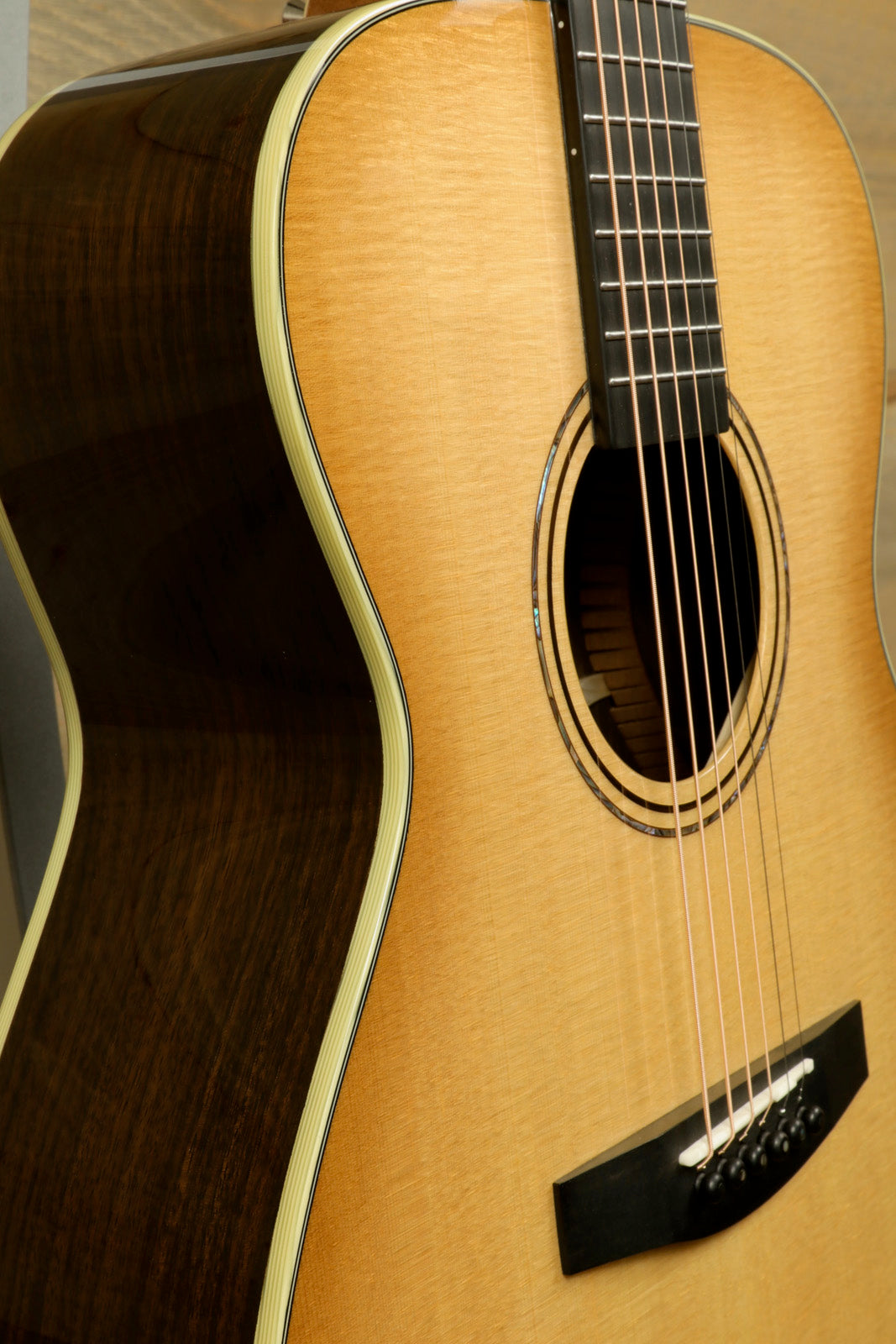 Alvarez LF70e Daybreak acoustic electric guitar with natural finish, front view showcasing detailed craftsmanship