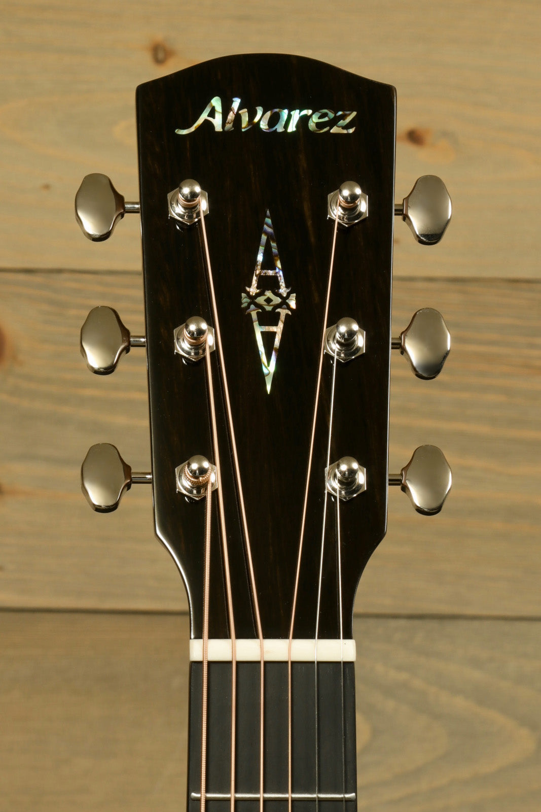 Alvarez LF70e Daybreak acoustic electric guitar headstock with intricate inlays, front view