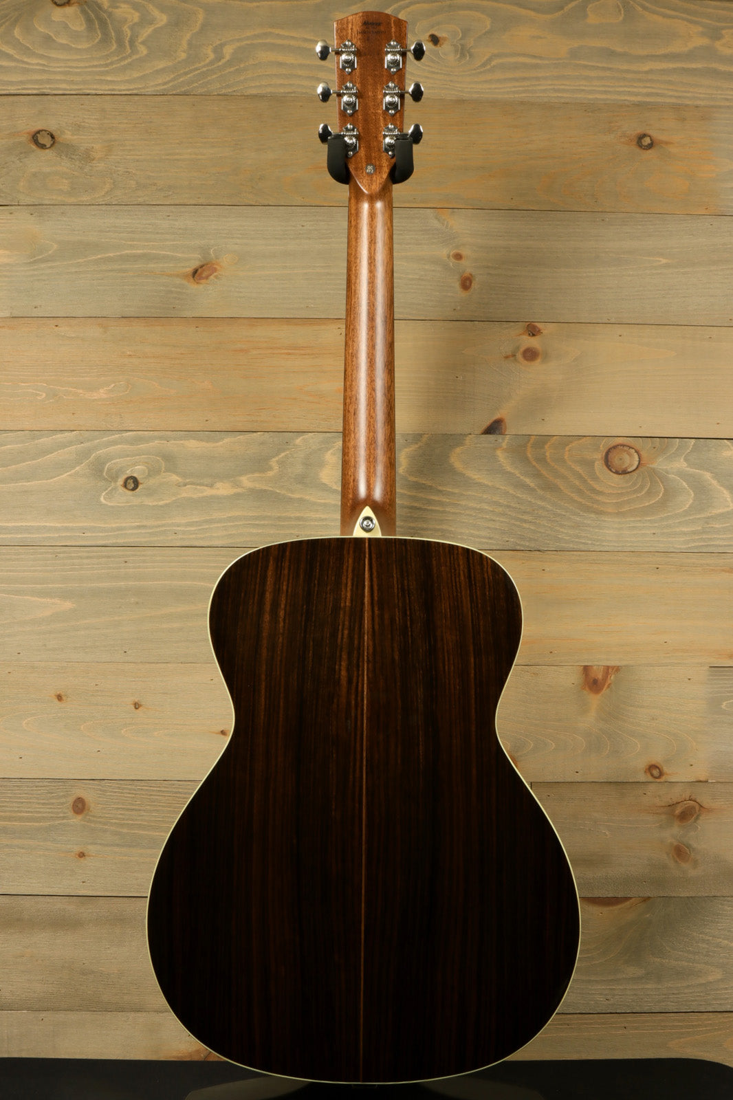 Alvarez LF70e Daybreak acoustic electric guitar, brown wood finish, back view showcasing detailed grain