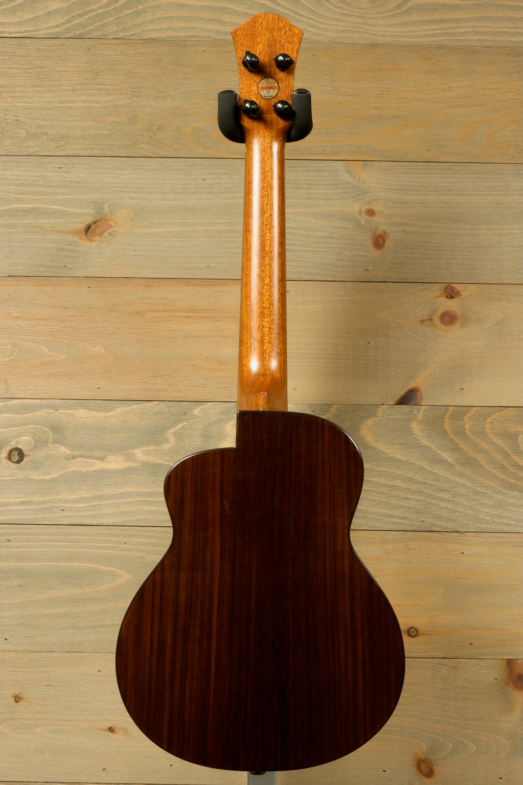 ANueNue UT200 ukulele in natural wood finish, back view showcasing beautiful grain patterns