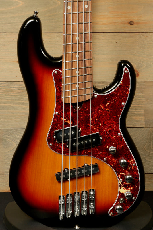 Tagima 5-string bass guitar in sunburst finish, front view with tortoise shell pickguard