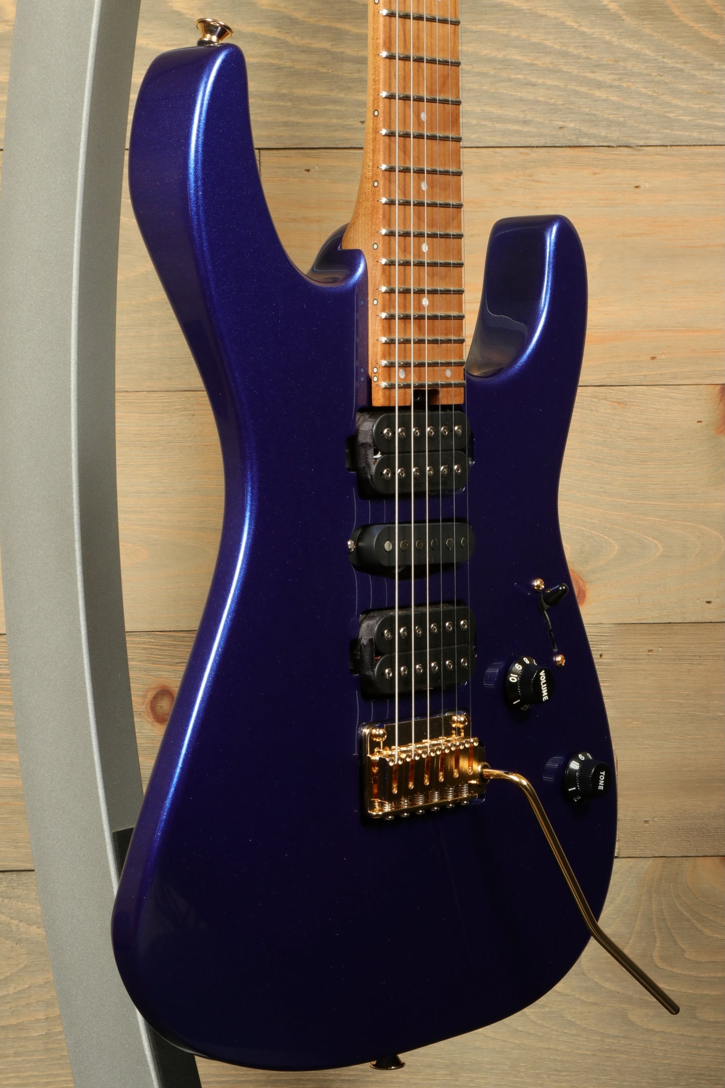 Charvel Pro-Mod DK24 Mystic Blue guitar with sleek design and versatile features