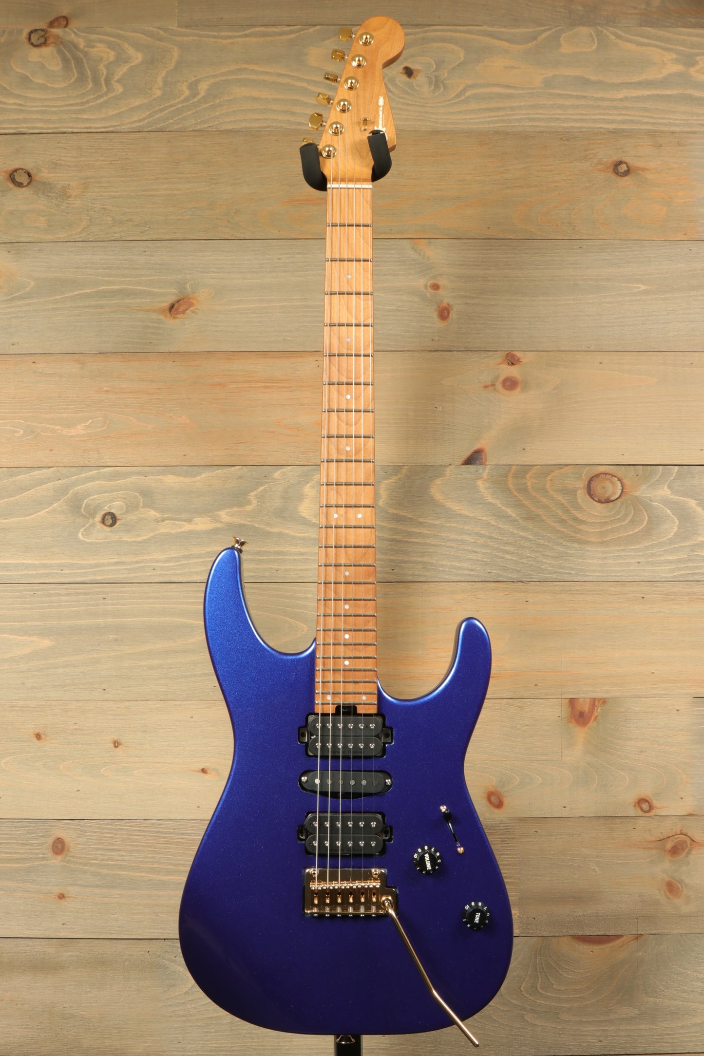 Charvel Pro-Mod DK24 Mystic Blue guitar with sleek body and maple neck for versatile sound