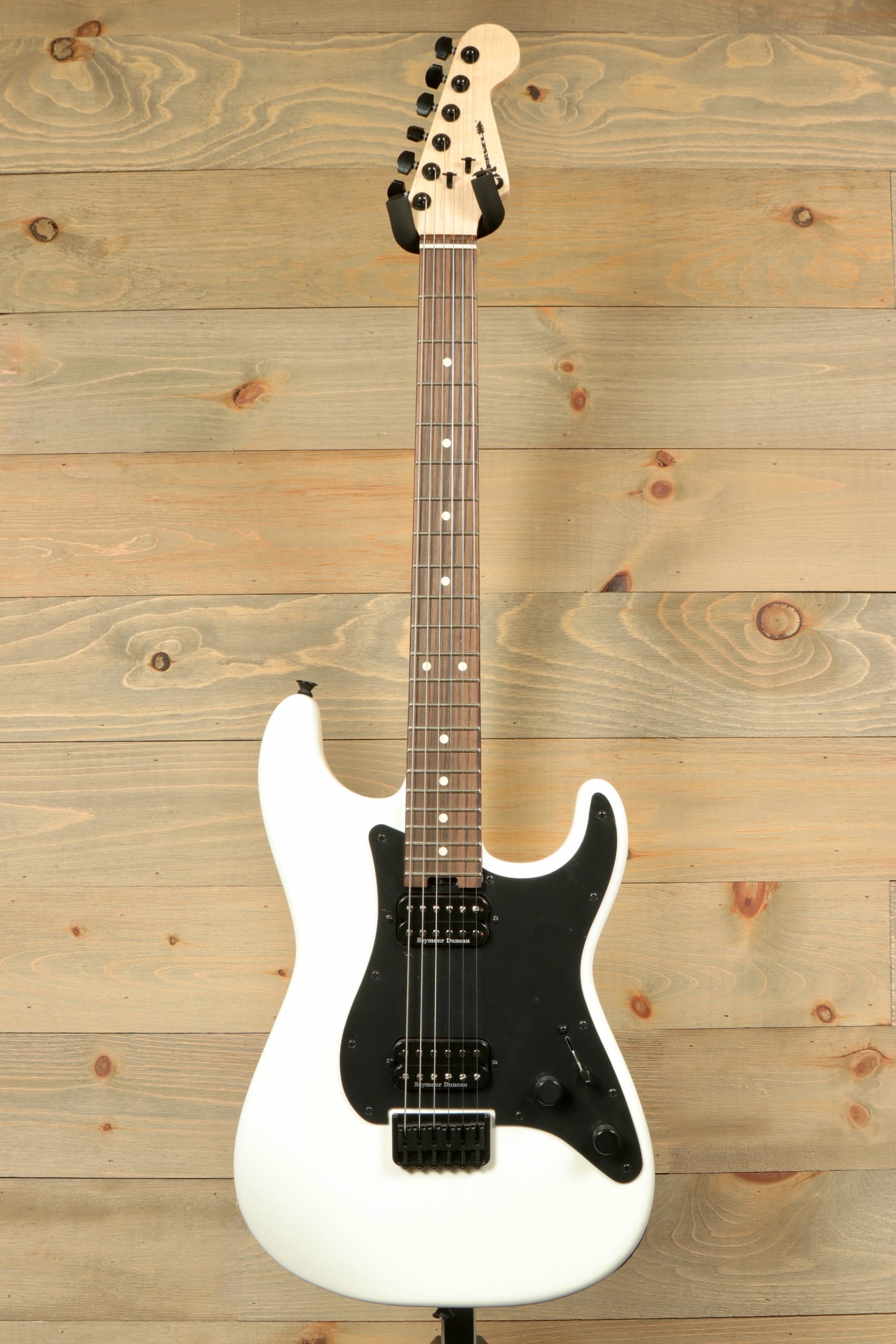 Charvel Pro-Mod So-Cal electric guitar in white with black pickguard and maple neck