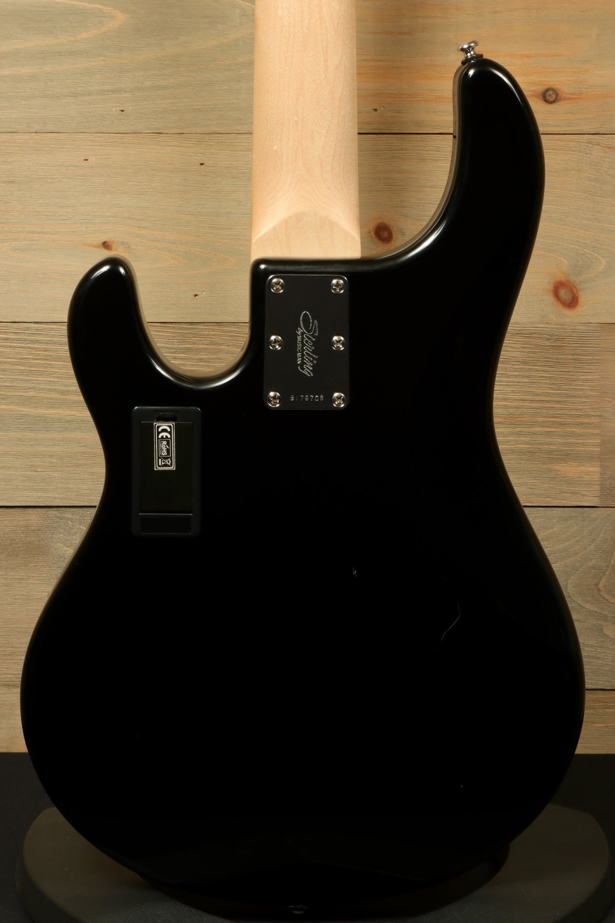 Sterling by Music Man black used active 5 string bass, back view showcasing sleek design