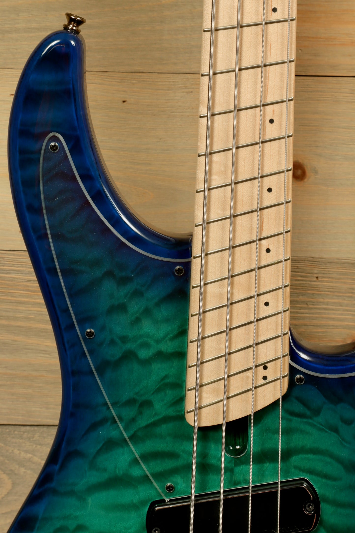 Dingwall Combustion Nashville bass guitar with a blue-green quilted finish, front view