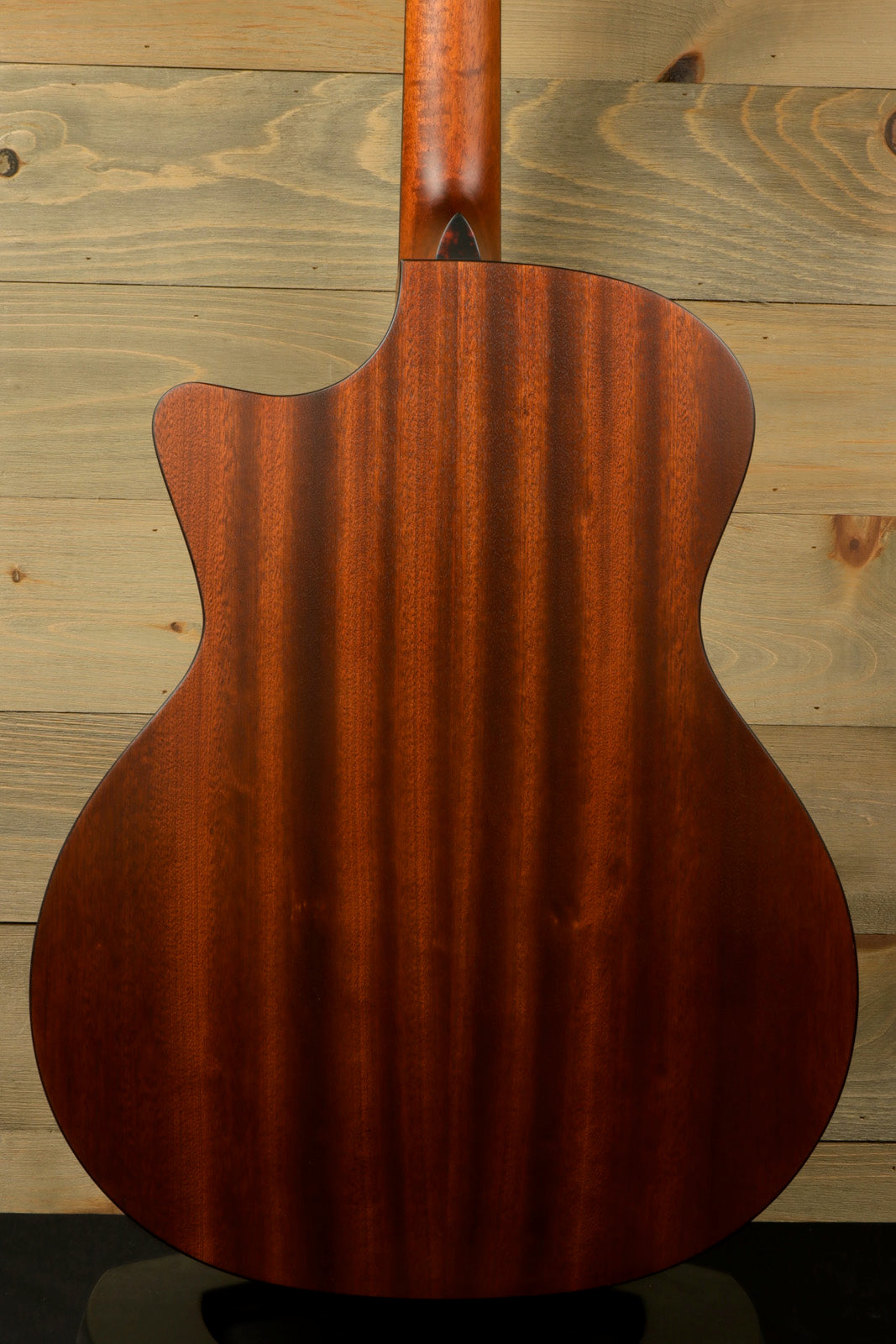 Eastman AC122-1CE acoustic electric guitar with a rich mahogany back, rear view