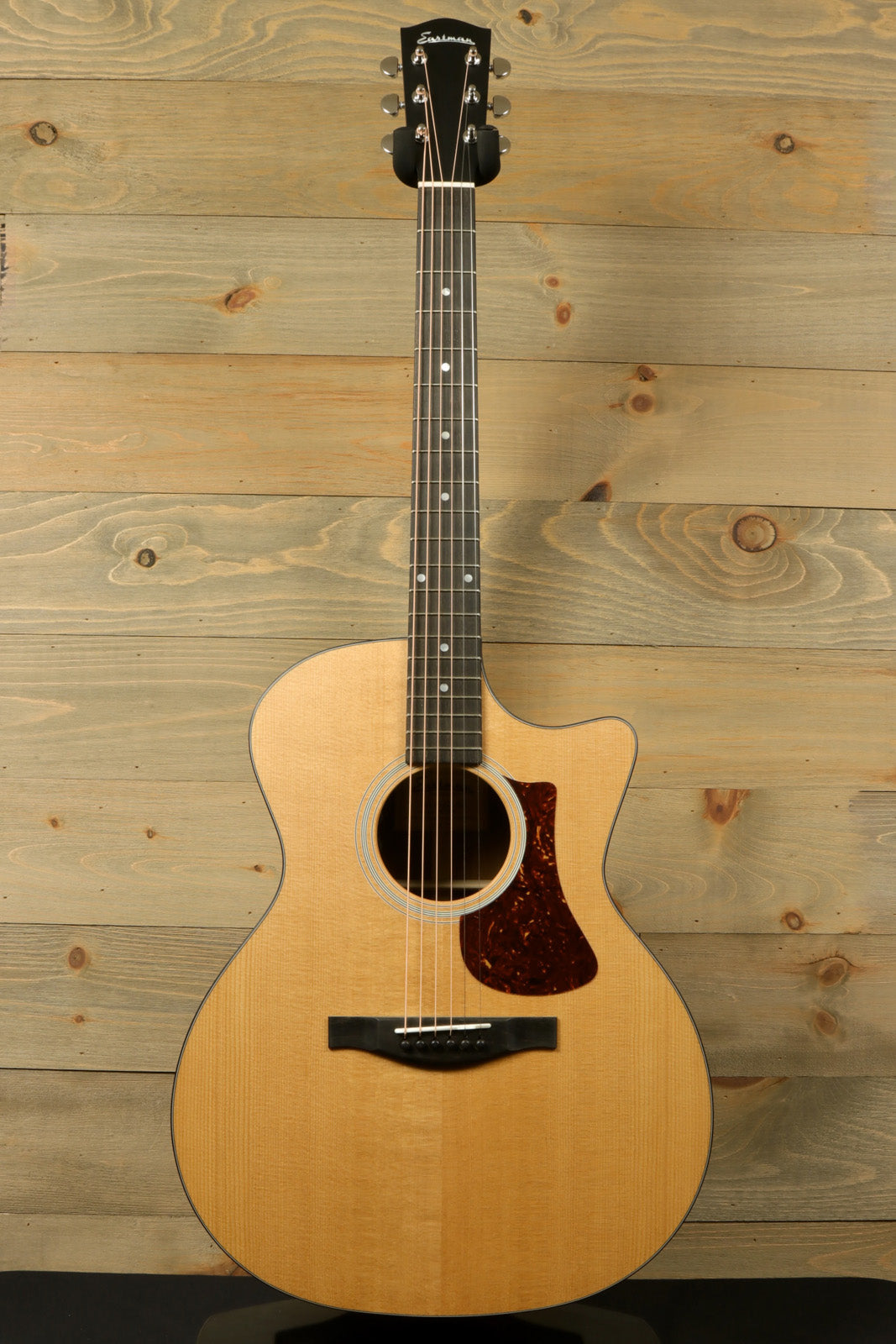 Eastman AC122-1CE natural finish acoustic electric guitar, front view showcasing beautiful craftsmanship