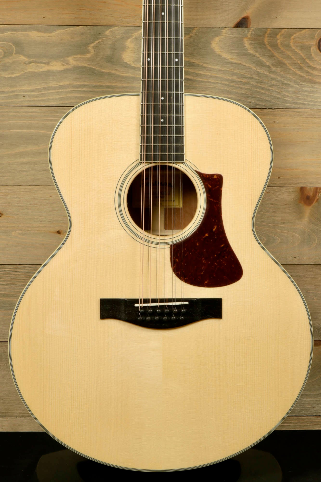 Eastman AC330E-12 12-string acoustic guitar with a natural finish and elegant design