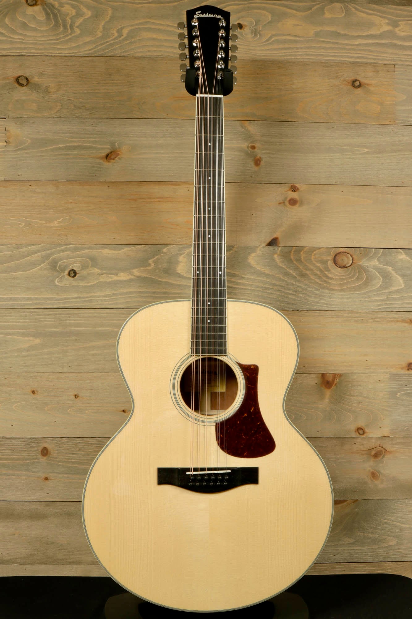 Eastman AC330E-12 12-string acoustic guitar with natural finish and elegant design