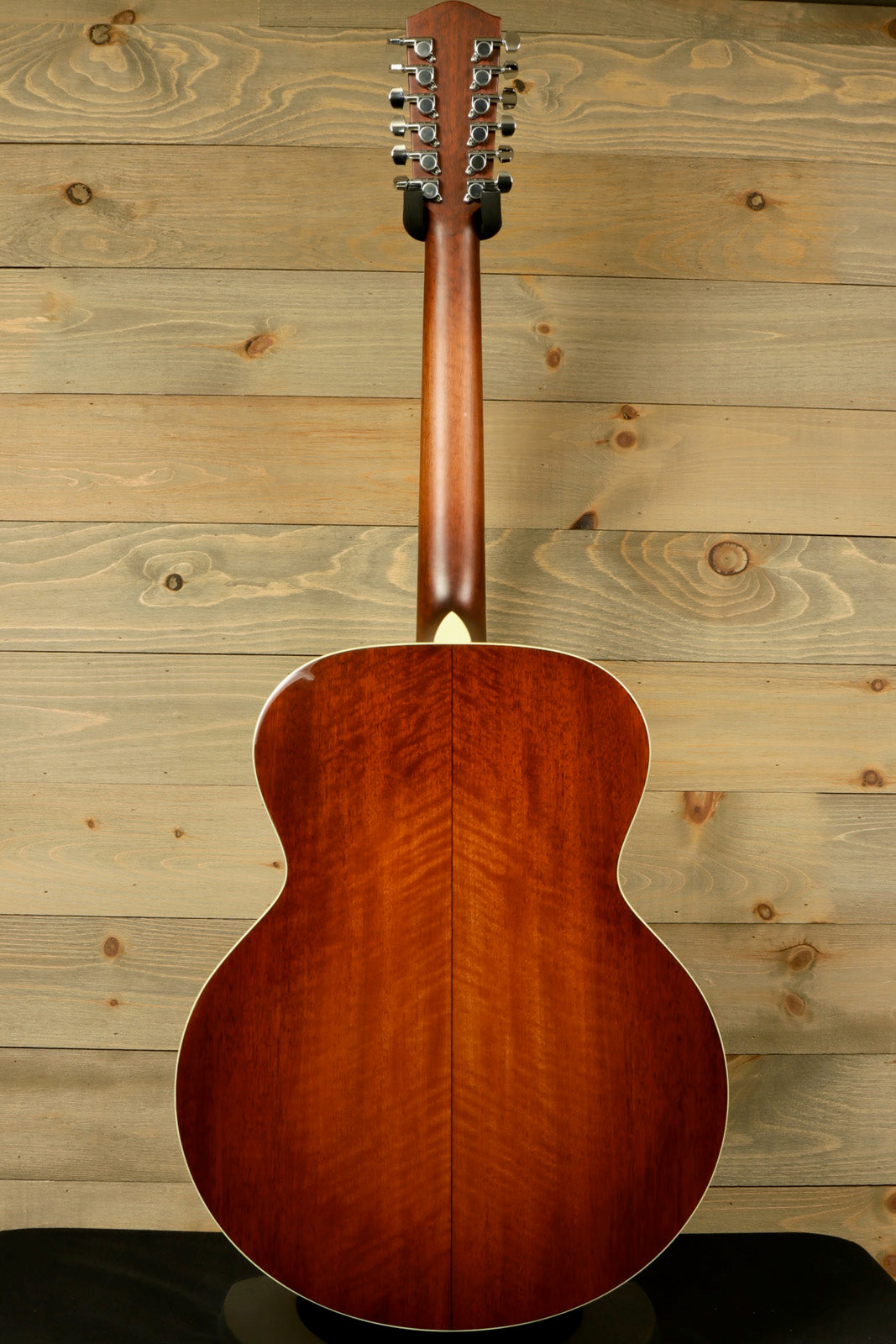 Back view of Eastman AC330E-12-SB 12-string acoustic guitar showcasing its rich wood finish