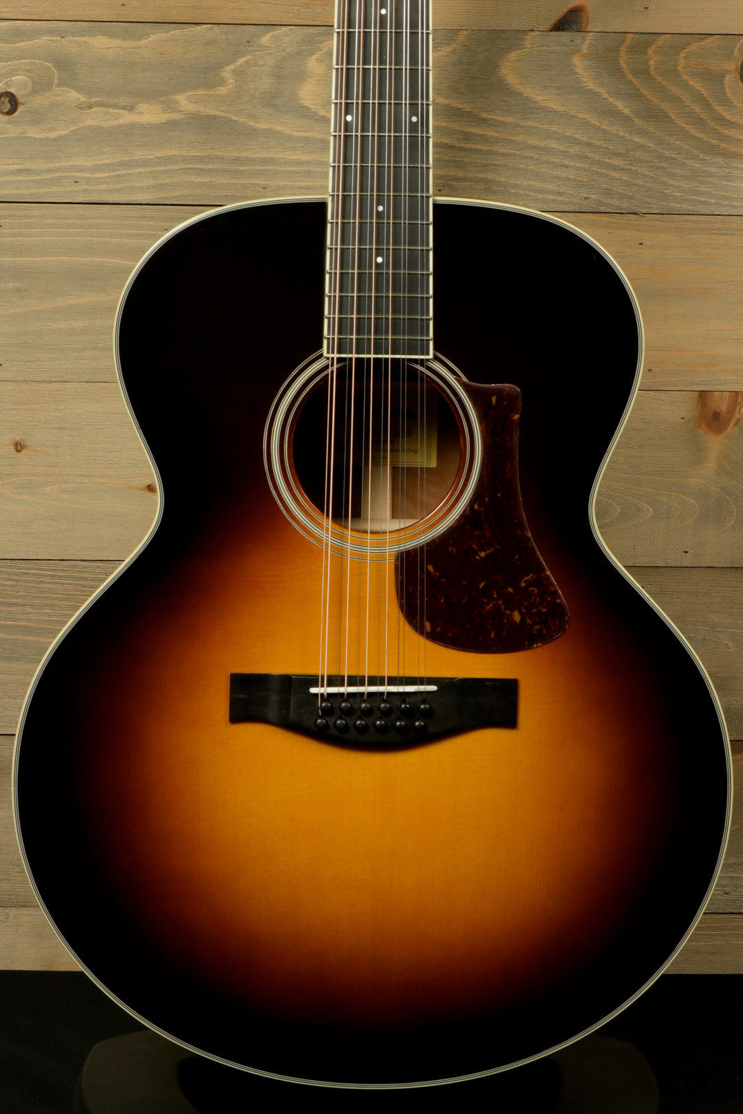 Eastman AC330E-12-SB 12-string acoustic guitar with sunburst finish and distinctive body shape
